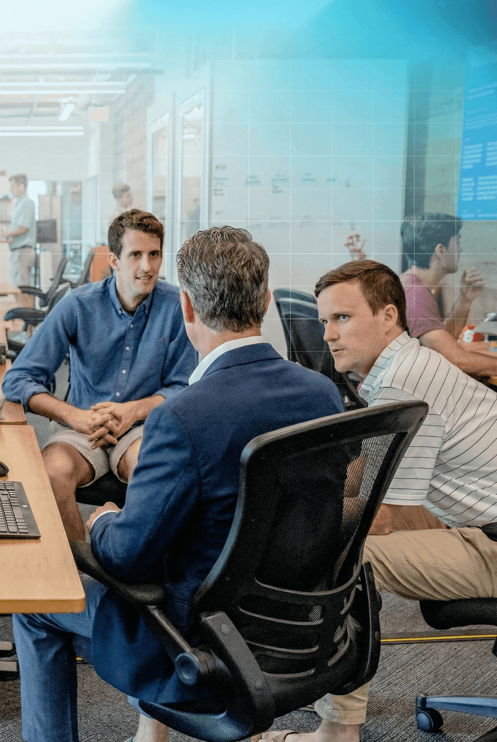 Businessmen discussing general liability policy.