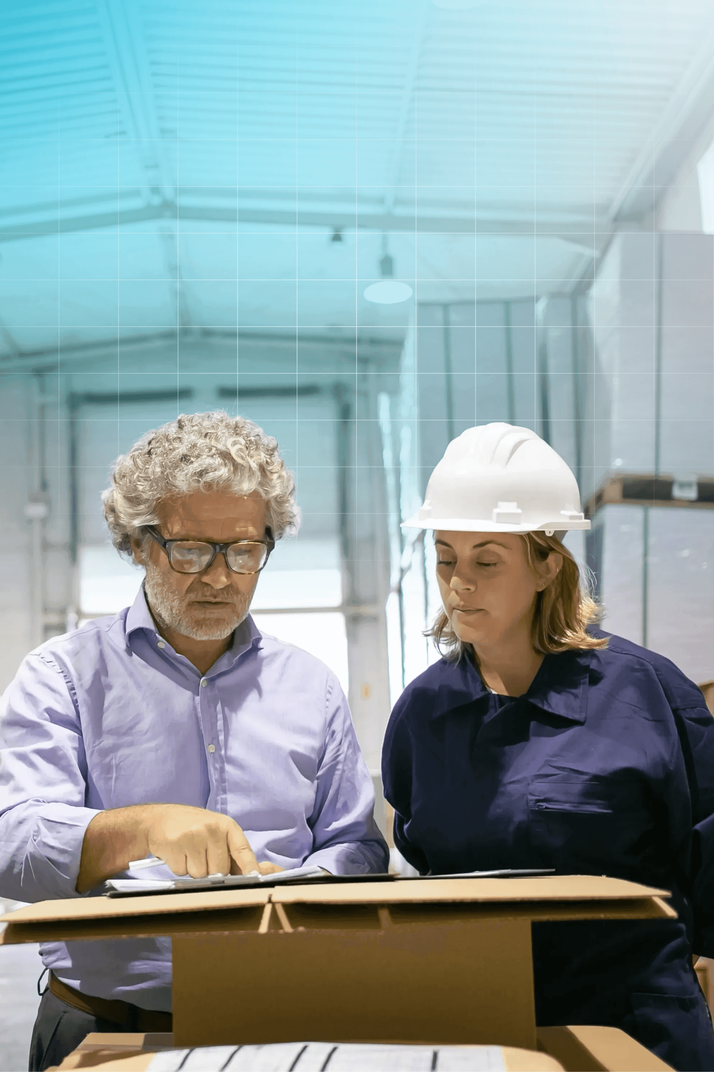 Two construction stakeholders comparing construction insurance.