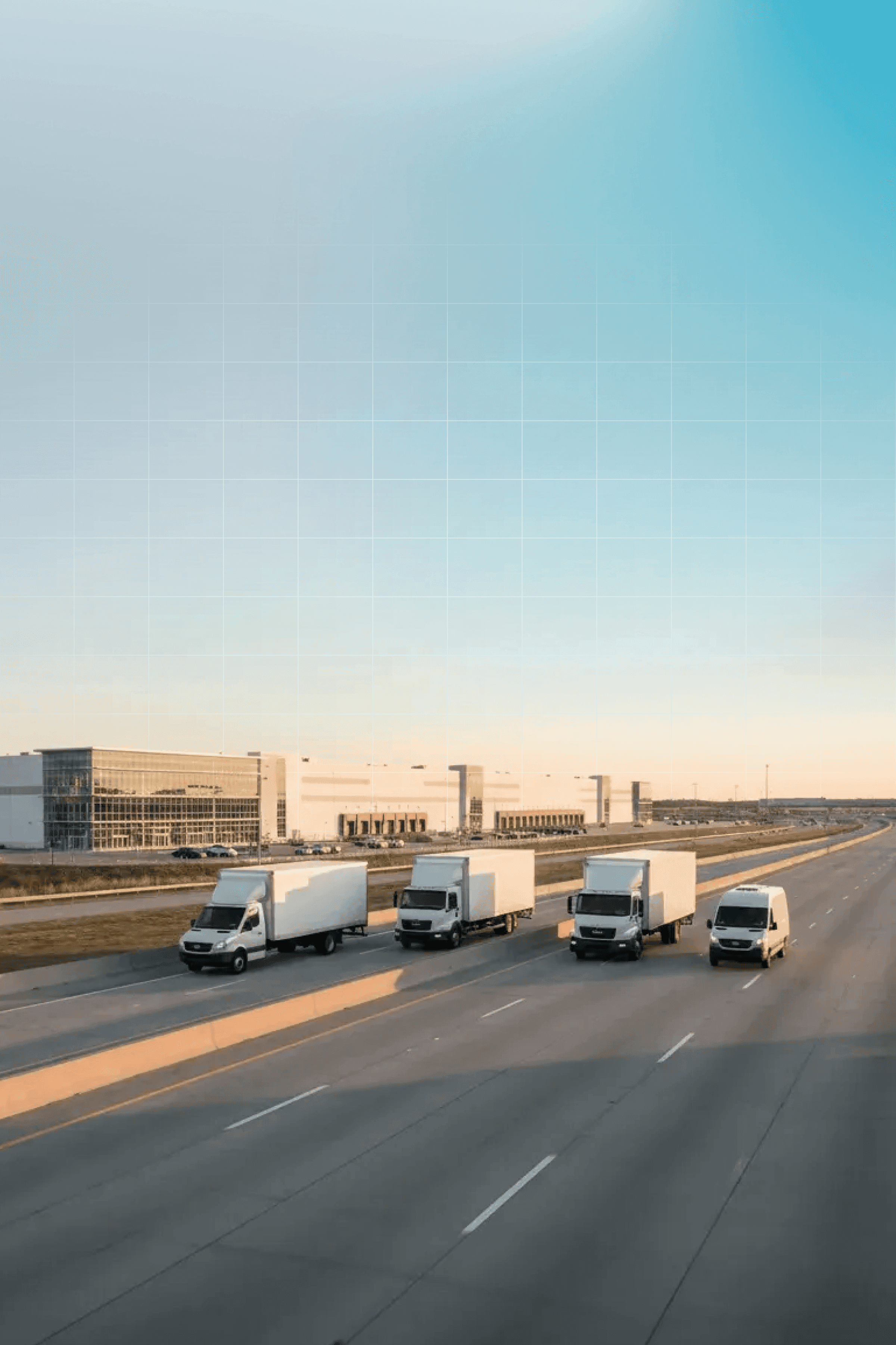 Four delivery vehicles on a highway.